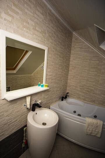 Фото номера Двухместный номер с 1 кроватью Отель SULO Hotel г. Атырау 5