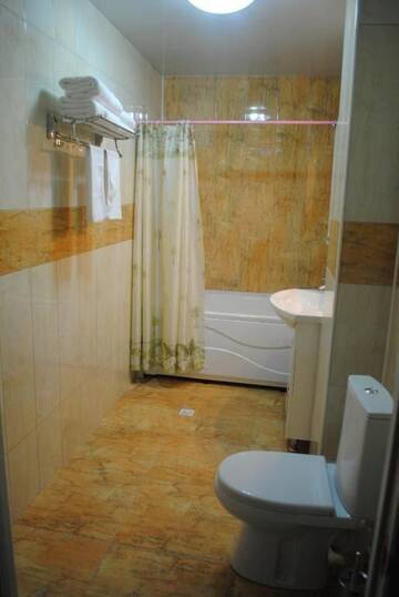 Фото номера Стандартные апартаменты Отель Sweet Home г. Атырау 4