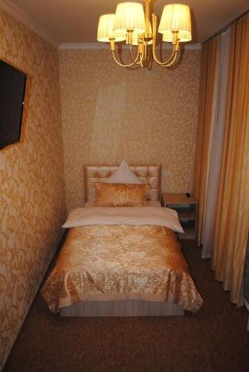 Фото номера Одноместный номер с ванной комнатой Отель Sweet Home г. Атырау 3