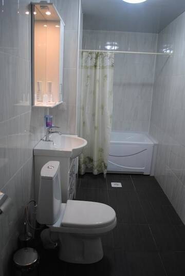 Фото номера Стандартные апартаменты Отель Sweet Home г. Атырау 5